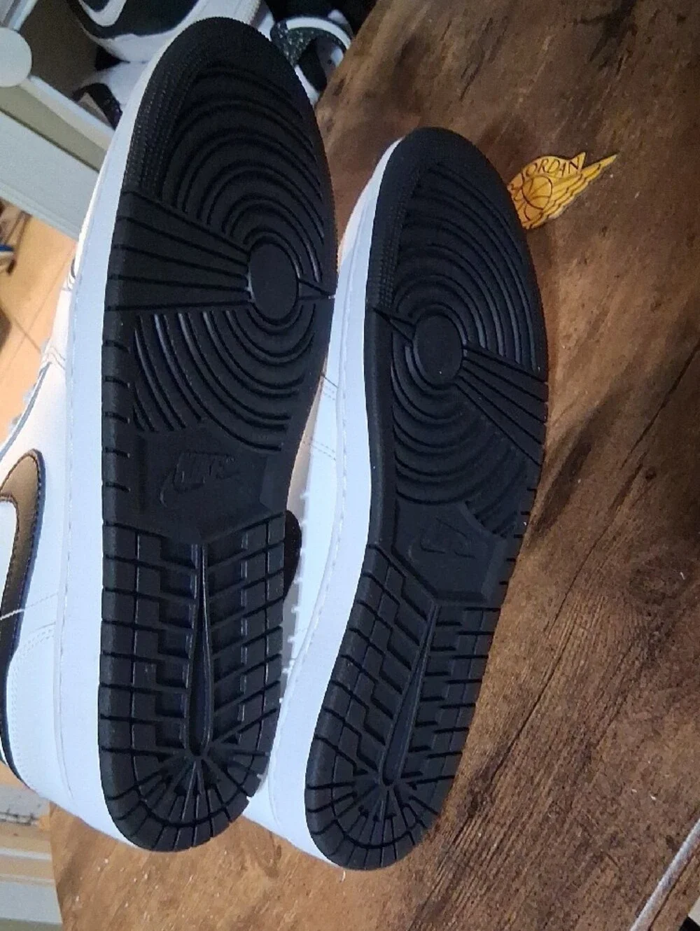 Jordan White Black and Orange Mid-Top Sneakers